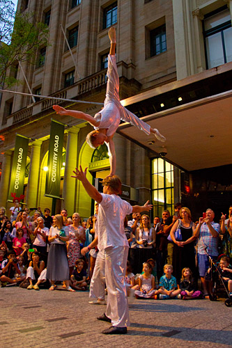 Acrobatic performers in Queens Mall