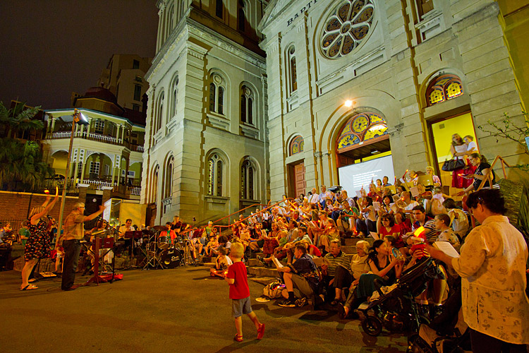 Christmas carols in front of the Brisbane City Tabernacle church.